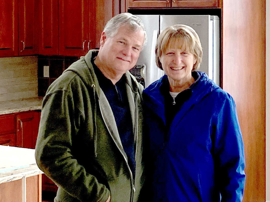 Joseph and Maureen Dooley stand in their kitchen of their newly built house on Strawberry Street.